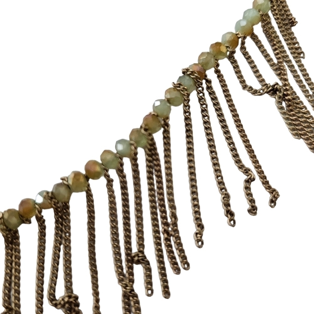 Freedom gold and green long necklace with a boho feeling fringe. - Picture 9 of 12